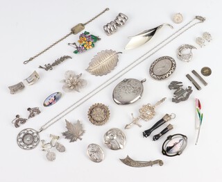 A silver locket and minor silver jewellery 236 grams 