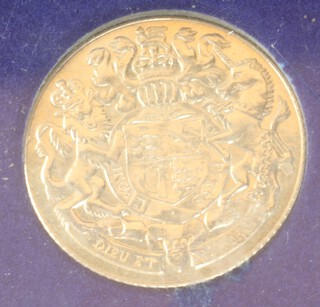 A 9ct yellow gold commemorative Queen Elizabeth II Silver Jubilee coin, 3.1 grams 