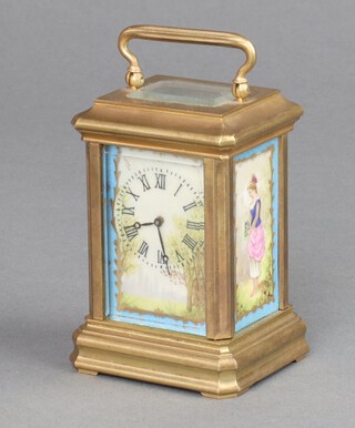 A 19th Century brass miniature carriage timepiece with painted porcelain panels depicting figures and landscapes 9cm to the handle 