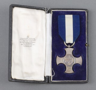 A George VI issue Distinguished Service Cross dated 1945, un-named, as issued, hallmarked London 1948, contained in original Garrards case 