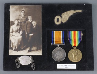 A pair of medals  to 2nd Lieutenant T.P.S.  Summerson Royal Flying Corps, comprising British War medal and Victory medal mounted with observer's half wing, identity bracelet marked 2nd Lieutenant TPS Summerson RFC CofE, together with a photograph of the recipient and family 