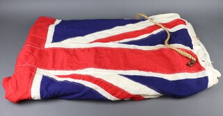 A large stitched white ensign, the corner marked White ENS8 5714000 163cm x 355cm 