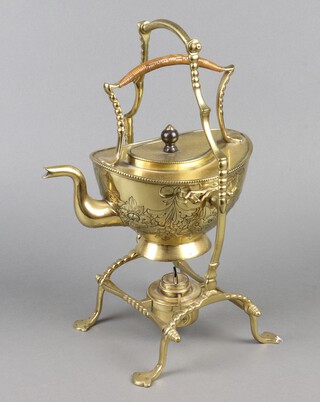 A Victorian embossed brass tea kettle and stand complete with burner 37cm x 18cm x 19cm 