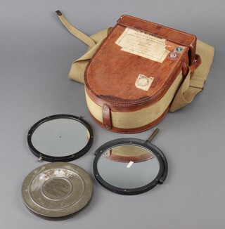 A heliograph 5-" Mk. V, contained in a leather carrying case 