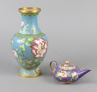 A blue and floral ground cloisonne enamel teapot 4cm x 6cm together with a floral patterned ditto vase 20cm 