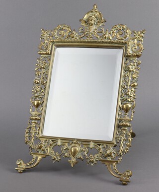 A Victorian rectangular bevelled plate easel mirror contained in a pierced gilt metal frame 44cm h x 26cm w 