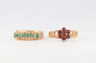 A 9ct yellow gold emerald ring size L 1/2 and a garnet ditto size N 1/2, 4.6 grams 