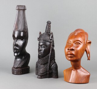 An African carved ebony portrait bust of a lady 40cm x 11cm, 1 other 32cm x 15cm and 1 other 