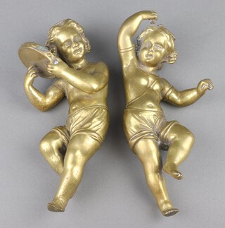 A pair of gilt bronze figures of cherubs 20cm 