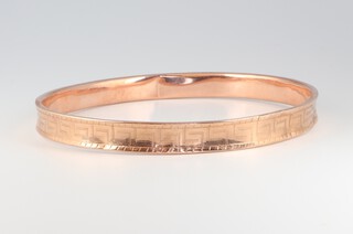 A 9ct yellow gold hollow bangle 9.2 grams 