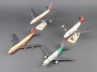 Four plastic models of air liners - Air India, Air Seychelles, Qantas and Virgin, 