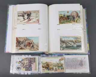 A collection of Liebig trade cards contained in an album and other loose Liebig cards 