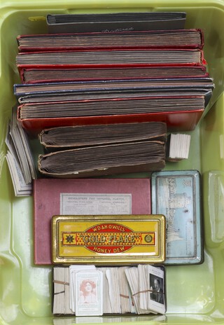 A collection of loose cigarette cards and some in albums including Wills, Players, Lambert & Butler etc 