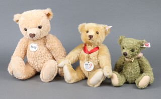 A Steiff Centenary bear with medallion no.671050 26cm, a brown Steiff bear no.421334 22cm and a Steiff bear no. 02256 35cm, without boxes and no certificates 