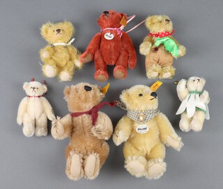 A Steiff bear no.029073 15cm, a Steiff 1909 replica bear no.040115 14cm, a Steiff bear no.040252 12cm  and 4 miniature Herman bears 10cm and 9cm, without boxes and no certificates 