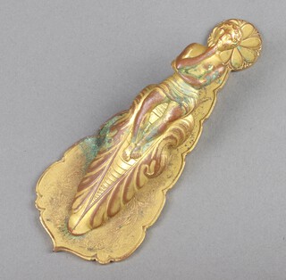 A Victorian gilt metal paper clip in the form of a seated man 14cm 