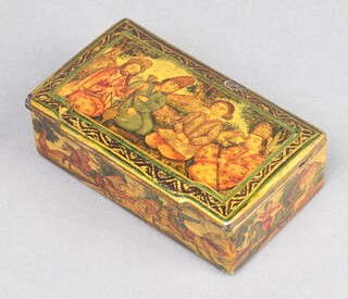 Two  rectangular Russian boxes the lids decorated seated figures, the inside hunting scenes 2cm x 9cm x 5cm 