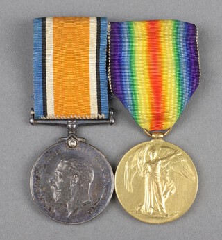 A pair of World War One medals to 12887 Private W E Alder Hampshire Regiment comprising British War medal and Victory medal 