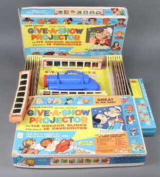 Chad Valley, 2 boxed Give a Show projectors and slides (1st and 2nd edition) together with an extra box of slides and a collection of loose slides