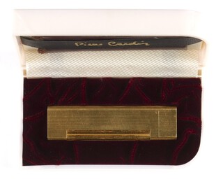 A mid-Century Pierre Cardin gold plated cigarette lighter 