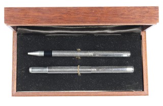 An Ego Omas design silver ballpoint pen and fountain pen with 14ct nib, boxed