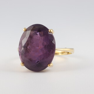 A yellow gold testing as 18ct amethyst ring, 5.4 grams, size M 