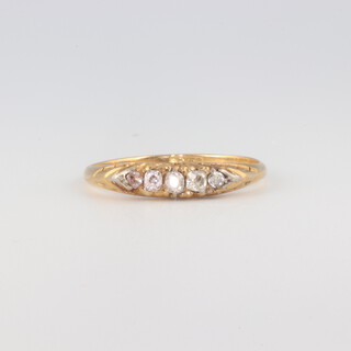 A Victorian yellow gold testing as 18ct 5 stone diamond ring, each approx. 0.15ct, 2.1 grams, size M 