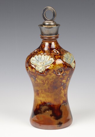 A Doulton Lambeth waisted liqueur bottle with stylised flowers and silver mounts, London 1901, 27cm 