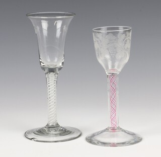 A 19th Century engraved cordial glass with 2 colour air twist stem 14cm together with a ditto with white glass twist stem 16cm 