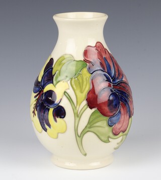 A Walter Moorcroft cream ground baluster vase decorated hibiscus 20cm 