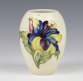 A Moorcroft cream ground oviform vase decorated with hibiscus with Queen Mary label 13cm 