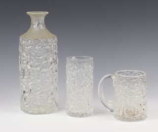 A Whitefriars clear glass "Glacier" decanter 25cm, a ditto beaker 14cm and a mug 11cm 