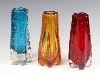 A Whitefriars ruby red glass lobed vase with controlled air bubbles 18cm, a kingfisher blue ditto 18cm and a tangerine orange ditto, pattern no: 9772, 18cm 