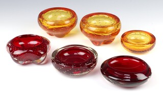 A Whitefriars ruby red glass ashtray 11cm, 2 others and 3 tangerine orange ditto 