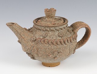 Ian Godfrey (British 1942-1992) a stoneware teapot with geometric decoration and scroll handle 13cm 