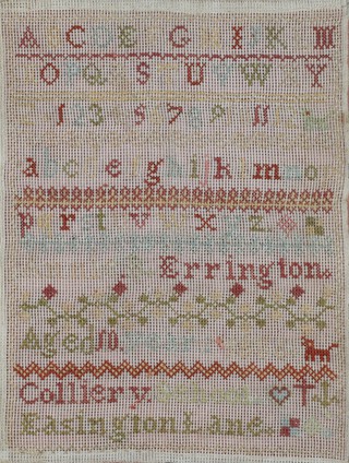 A Victorian wool work sampler with alphabets and numbers, dogs, anchors, crosses and hearts by Sarah Errington aged 10 years, Colliery School, Easington Lane 39cm x 39cm 