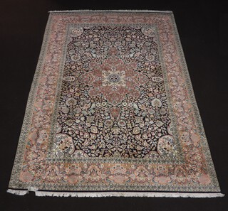 A North Persian blue, pink and white ground silk carpet with central floral medallion decorated birds 333cm x 211cm 