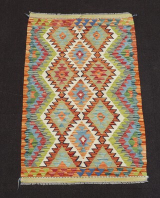 A white, green and turquoise ground Chobi Kilim rug 124cm x 77cm 