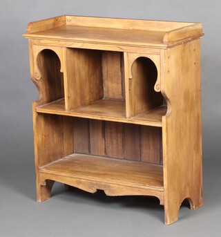 An Edwardian Art Nouveau elm bookcase with 3/4 gallery, the upper section niches, raised on bracket feet 86cm h x 77cm w x 33cm d 