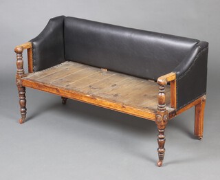 A William IV pine and mahogany dogs bed in the form of a sofa,  raised on turned supports 62cm h x 119cm l x 47cm w (inside 98cm x 33cm) 