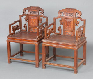 A pair of Chinese carved and pierced hardwood throne chairs 101cm h x 64cm w x 51cm d (seats 38cm x 33cm) 