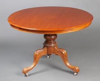 A Victorian circular mahogany Loo table, raised on a pillar and tripod base with ceramic casters 72cm h x 104cm diam. 