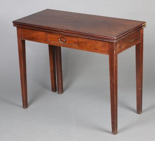 A Georgian mahogany tea table fitted a frieze drawer, raised on square supports 74cm h x 91cm w x 44cm d 