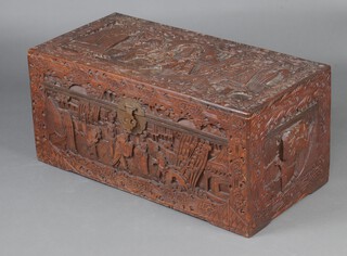 A camphor twin handled trunk with heavily carved decoration, the interior fitted a tray  40cm h x 86cm h 2 x 43cm d  