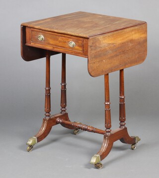 A 19th Century mahogany drop flap sofa table raised on turned and fluted supports with H framed stretcher, scroll feet, brass caps and casters 76cm h x 50cm w x 51cm d 