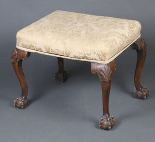 A Georgian style carved mahogany rectangular stool with upholstered seat, raised on carved cabriole ball and claw supports 46cm h x 56cm w x 43cm d 