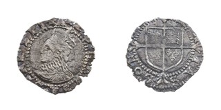 United Kingdom, Elizabeth I, 1558-1603, silver Penny (fifth issue), flan trimmed, 12mm, 0.3g. Obv: Crowned profile of Elizabeth, left / Rev: Quartered shield of arms over cross fourche. S.2575, F. 