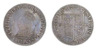 United Kingdom, Elizabeth I, 1558-1603, milled silver Shilling, 30mm, 6.2g. Obv: Crowned bust of Elizabeth, left / Rev: Quartered shield of arms over cross fourche. Mint mark Star. S.2590, VF. 