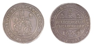 United Kingdom, Charles I, Oxford mint, 1642 silver Halfpound, 47mm, 60.1g. Obv: Charles on horseback, left, with upright sword, flowing sash, horse over arms and militaria, Oxford plume in field behind / Rev: Declaration in two straight lines, value and three Oxford plumes above. S2945, VF.