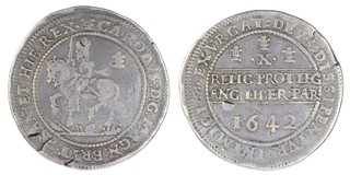 United Kingdom, Charles I, Oxford mint, 1642 silver Halfpound, 46mm, 59.0g. Obv: Charles on horseback, left, with upright sword, flowing sash, horse over arms and militaria, Oxford plume in field behind / Rev: Declaration in two straight lines, value and three Oxford plumes above. S2945, F. 